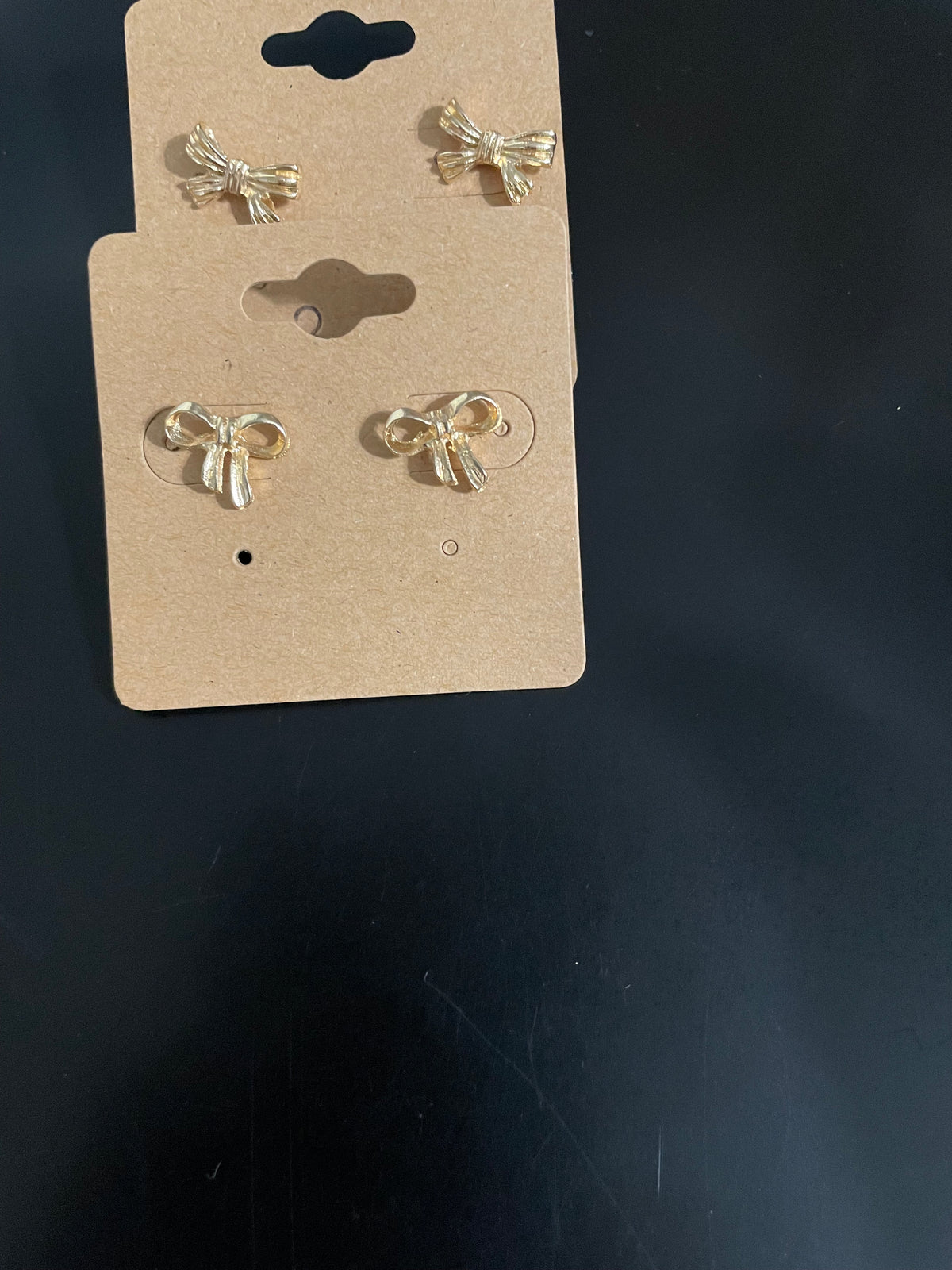 2 small bow tie earrings
